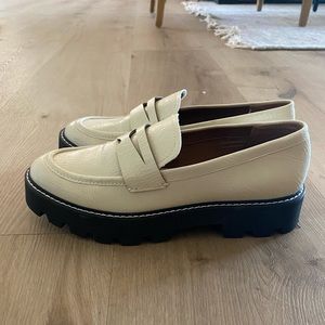 White platform loafers by Franco Sarto